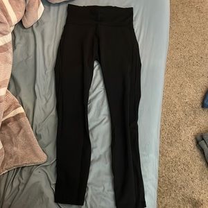 Black LuluLemon Leggings with drawstring and mesh on side size 4